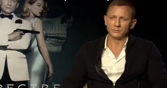Daniel Craig is very unimpressed with reporter's suggestion to do the "James Bond pout"