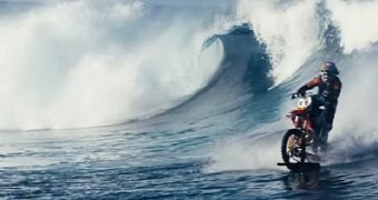Stunt rider takes his motorbike surfing
