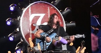 Dave Grohl sits on his custom made throne in Washington, D.C. concert