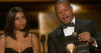 Taraji P. Henson rolls her eyes at the Emmys 2015, after Terrence Howard kisses her on the cheek