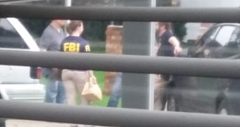 FBI agents outside of Shafer's house