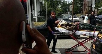Rapper Fetty Wap is taken to an ambulance on a gurney after his bike is hit by a car in New Jersey