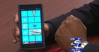 NYPD officer proudly presenting his Windows phone