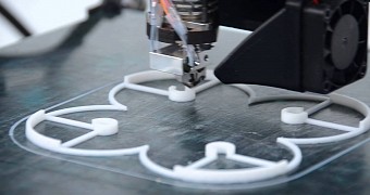 A 3D printer creating an object