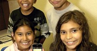 Cherokee Nation language immersion school students show off their new iPhones
