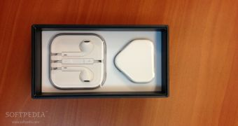 Apple EarPods inside the box of an iPhone 5