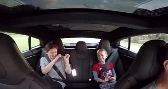 iPhone fights gravity as Tesla P85D accelerates with McLaren-grade torque