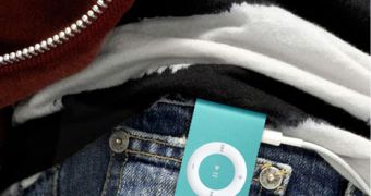 Teal 2GB iPod shuffle on pants