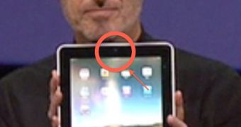 At the Yerba Buena Center for the Arts (San Francisco), Steve Jobs holds up his iPad demo unit for the attending crowd to see Apple's "latest creation"