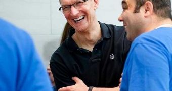 Tim Cook wearing the Nike FuelBand, a fitness-oriented device that will reportedly lend some of its functionality to the upcoming iWatch