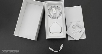 The adapter was included in the box of the iPhone 7