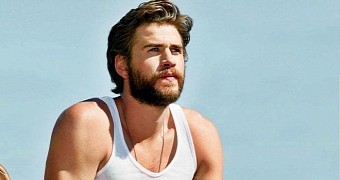 Photo of the Day: Liam Hemsworth Flirts with the Most Beautiful Girl in the World