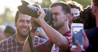 Taylor Lautner shoots Nicki Minaj's performance at London's Wireless Music Festival