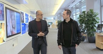 Nadella is always brushing his hands against each other