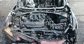 What the car looks like after the phone set it on fire