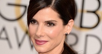 Sandra Bullock has been dating a photographer and a model for “several months”
