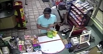 Crooks caught installing a card skimmer at a US gas station