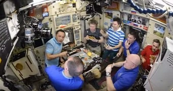Astronauts enjoy dinner aboard the International Space Station