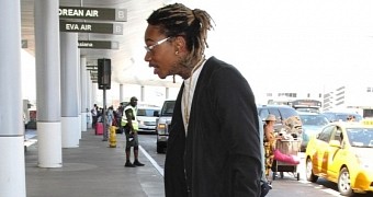 Wiz Khalifa rides his gold-plated hoverboard before LAX incident over his refusal to step off it