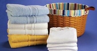 Woman discovered doing her laundry in neighbor's bathroom