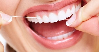 Vigorous flossing causes woman to develop a knee infection