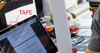 Mark Zuckerberg puts tape over his laptop's webcam