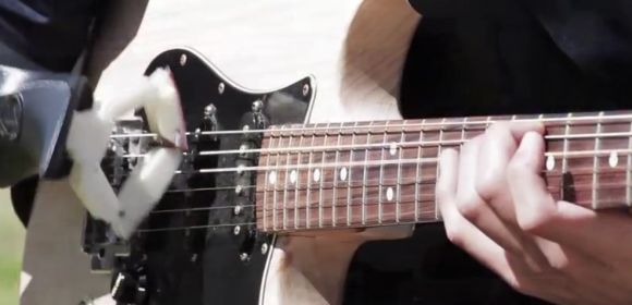 3D Printed Prosthetic Helps Kid Play a Mean Guitar Solo – Video