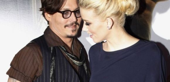 Amber Heard Broke Up with Johnny Depp Because He Cheated