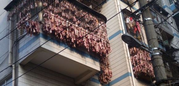 Chinese Resident Uses Smog Pollution to Flavor Meat on Balcony