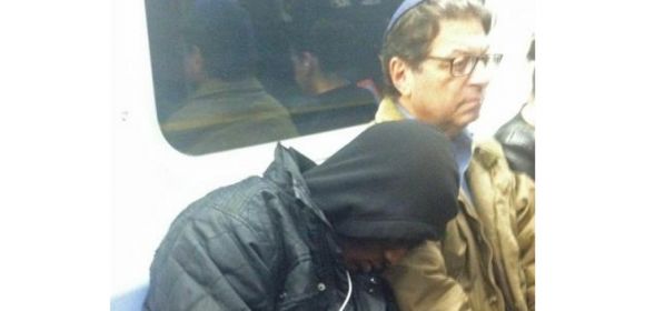 Man Lets Dozing Passenger on Subway Sleep on His Shoulder – Photo