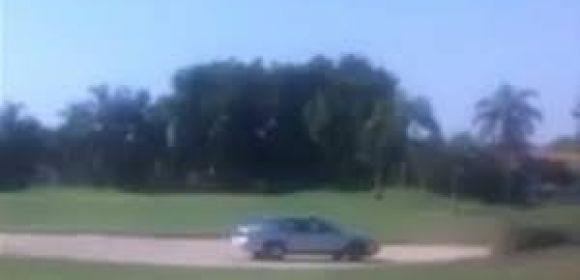 Old Lady Drives on Golf Course During US Qualifier Game