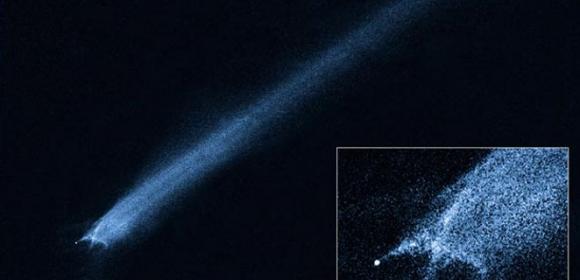 Space-Debris Field Attributed to Asteroid Collision