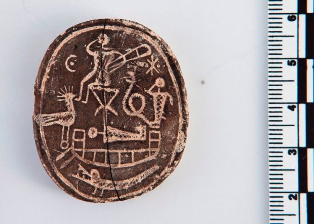 The images on the amulet are somewhat bizarre, researchers say