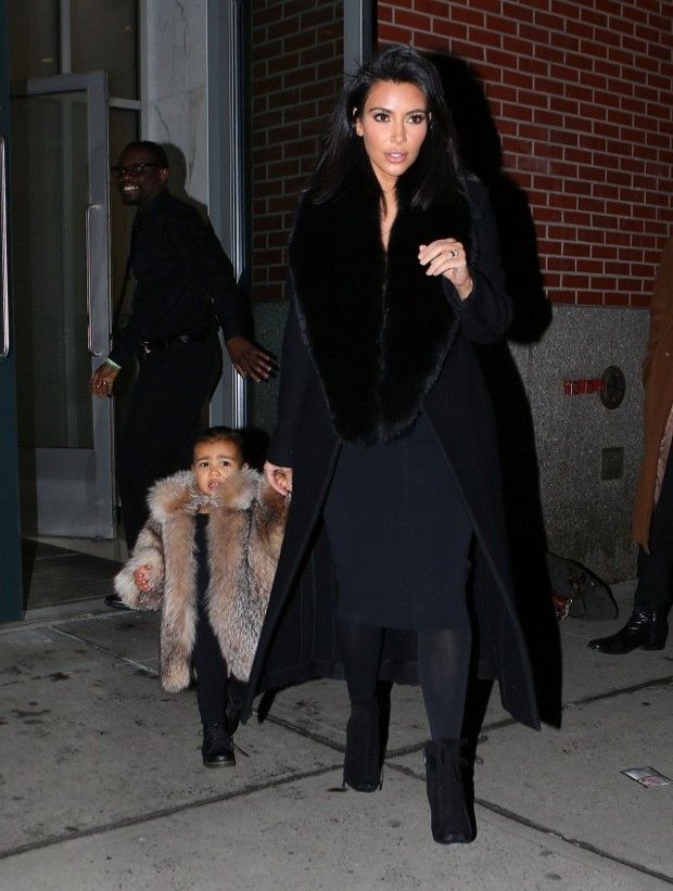 Her mother also wore a fur-collared black coat
