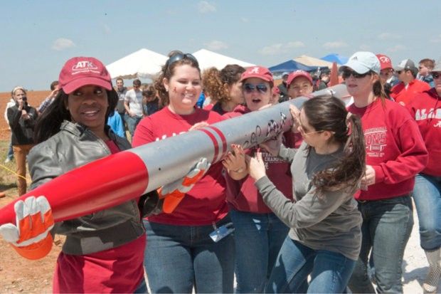 Students carry their rocket to the launch pad; April 22, 2012