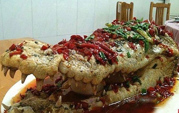 The stuffed crocodile head served to wedding guests in China