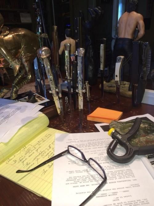 Stallone's working space seems to include the final page of the script for "Creed"