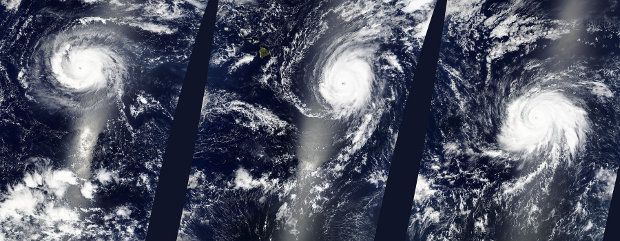 Hurricanes Kilo (left), Ignacio (center), and Jimena (right) lined up across the Central and Eastern Pacific Ocean