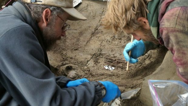 Professors Ben Potter and Josh Reuther shown excavating the burial site