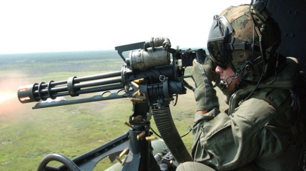 A helicopter-mounted minigun is similar to those that can be carried legally on the street