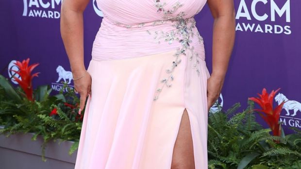 Beth Chapman shows off ample bosom in pink dress on the red carpet