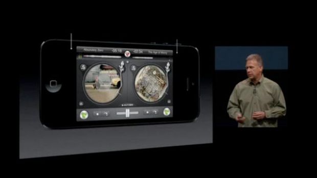 Apple's Phil Schiller demoing a non-native iPhone 5 app that runs in the middle of the screen with two dark stripes on the sides, where the remaining pixels have nothing to display