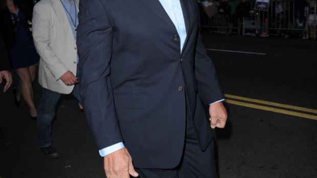 Arnold Schwarzenegger arrives at the premiere of “Expendables 3”