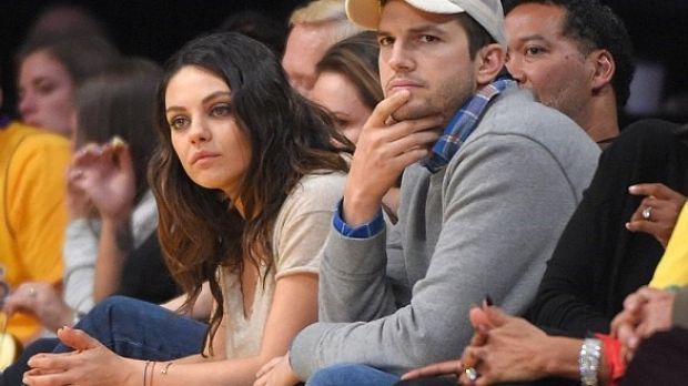 Mila Kunis and Ashton Kutcher probably got married in secret in late 2014
