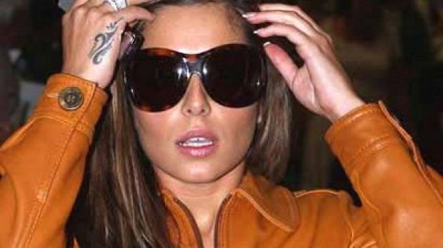 Cheryl Cole and her most visible tattoo, on her hand