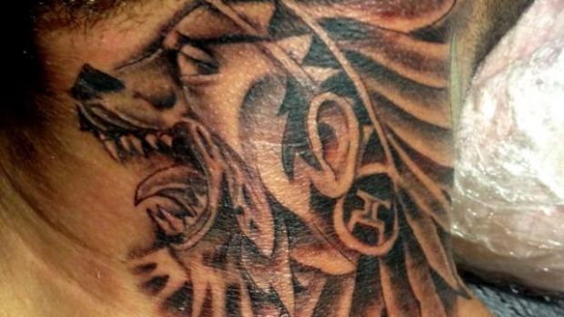 Chris Brown has a new, huge wolf tattoo on his neck