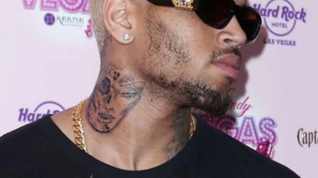 Chris Brown shows off new neck tattoo, causes quite a stir