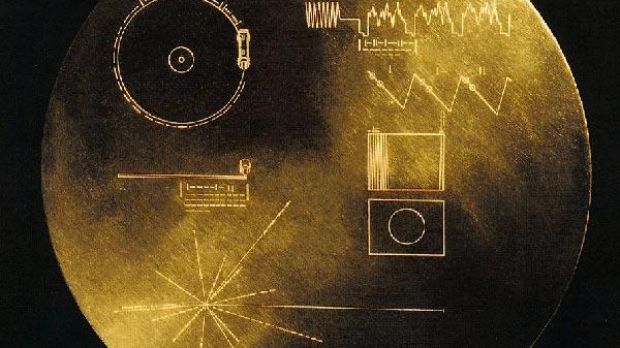 The golden record on Voyager that contains pictures and sounds of Earth, along with symbolic directions for playing the record and data detailing the location of Earth.