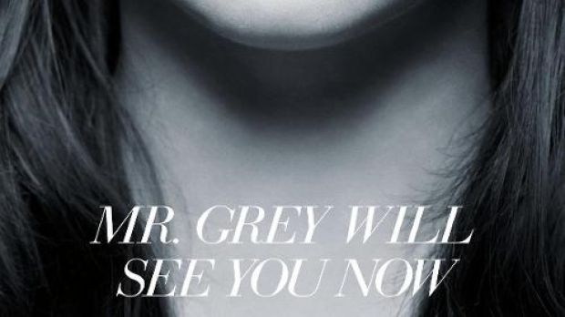 Anastasia Steele bites her lip on new poster for “Fifty Shades of Grey”