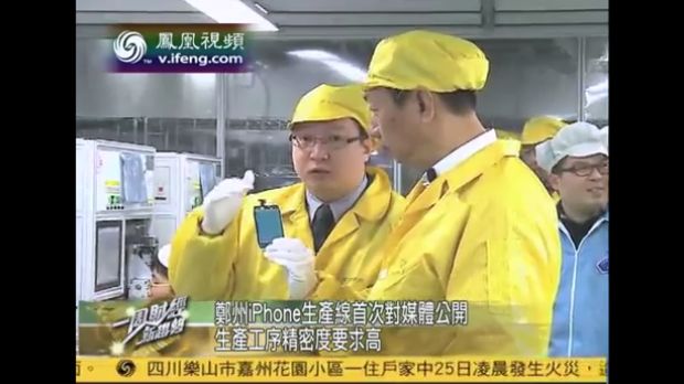 Foxconn CEO, Terry Gou and a Chinese reporter discussing iPhone assembly